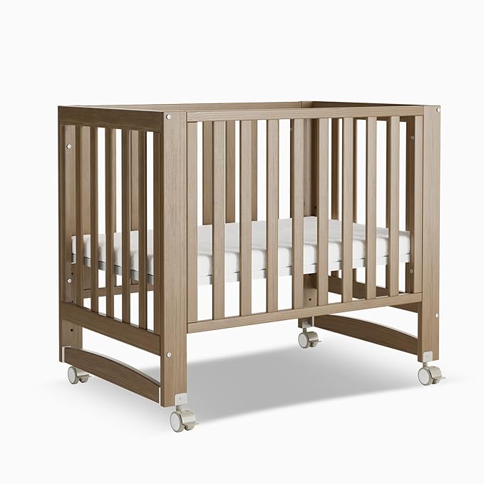 EvoNest Baby Crib, 6 in 1 Convertible Mini Crib with Wheels, 100% New Zealand Wood Growing Bed, 4 Adjustable Mattress Height,Walnut Brown (Walnut Brown)