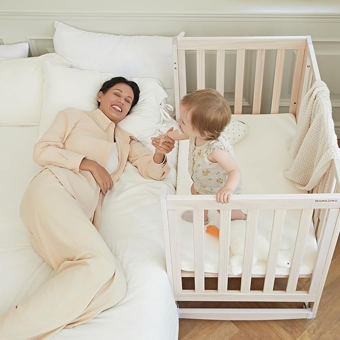EvoNest Baby Crib, 6 in 1 Convertible Mini Crib with Wheels, 100% New Zealand Solid Wood Growing Bed, 4 Adjustable Mattress Height,Washed Natural