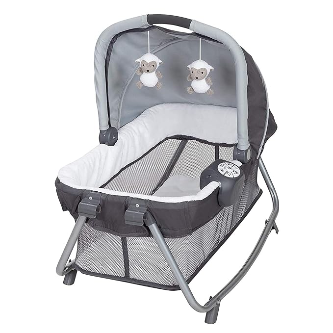 Baby Trend Nursery Center Travel Crib with Removable Rock-A-Bye Bassinet, Changing Table, Organizer, and Electronic Music Center and Nightlight, Robin